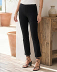 Black ankle slit pant with elastic waistband and slim fit design