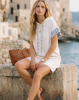Dayna Contrast Hoodie Dress in organic French terry with blue striped hood and drawstrings, relaxed fit, above-knee length.