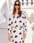 Serafina Top with abstract dot print, 3/4 puff sleeves, boat neck, and elasticized hem in Sahara Twill fabric