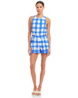 Woman wearing Betty Picnic Shorts in blue and white watercolor check print with elastic waistband and side pockets.