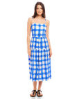 Woman wearing blue and white watercolor check Costa Dress with adjustable spaghetti straps and square neck
