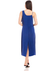 Back view of woman wearing blue Serena Midi Dress with back slit and adjustable shoulder straps