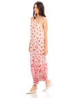 Jaylen Border Print Dress with watercolor border design, halter neckline, fitted silhouette, side slits, and adjustable straps in twill fabric
