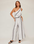 Woman wearing Vanita One-Shoulder Top striped linen blend with knotted detail and wide-leg pants