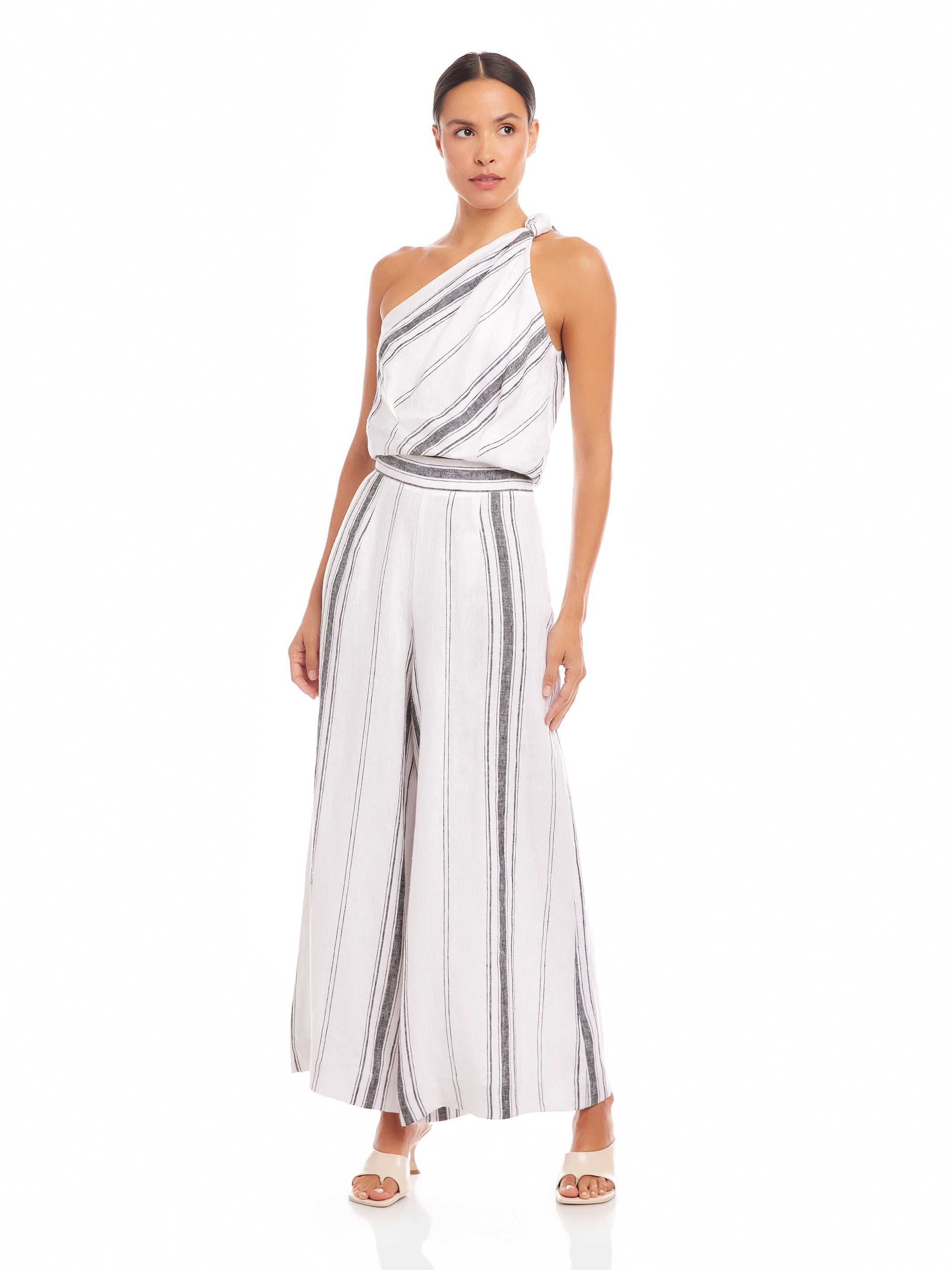 Woman wearing Vivienne Wide-Leg Pants in breathable striped linen blend for a chic casual look