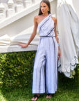 Woman wearing breathable linen blend Vivienne Wide-Leg Pants with striped design and wide legs outdoors
