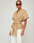 Kai Belted Button-Up Top with short cuffed sleeves, tortoise buttons, and adjustable waist tie in stretch cotton twill