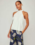 Alexis Faux Leather halter top with sleek neckline and back keyhole closure