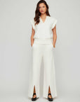 Front-Slit Sweatpants in wide-leg fleece with elastic waist and side pockets