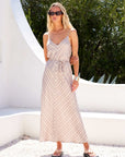 Khaki Cami Midi Dress with textured chevron stripes, adjustable straps, and drawstring waist, sleeveless V-neck satin midi length
