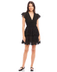 Black Isla Embroidered Tiered Dress with V-neck, cap sleeves, fitted waist, and tiered eyelet skirt on model