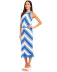 Woman wearing an Amber Crochet Skirt with bold chevron pattern, body-skimming fit, pull-on waistband, and fringe hem detail.