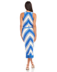 Back view of a woman wearing a blue and white chevron patterned Amber Crochet Skirt with fringe hem and matching tank top