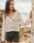 Nila Hand Crochet Pullover with relaxed fit, sheer V-neck, long sleeves, and intricate cotton-spandex crochet knit.
