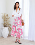 Rhea Smocked Waist Skirt in peony pink watercolor floral print with smocked waistband and midi length