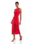 Woman wearing a red Maddie Side-Knot Midi Dress with side slit and sleeveless design