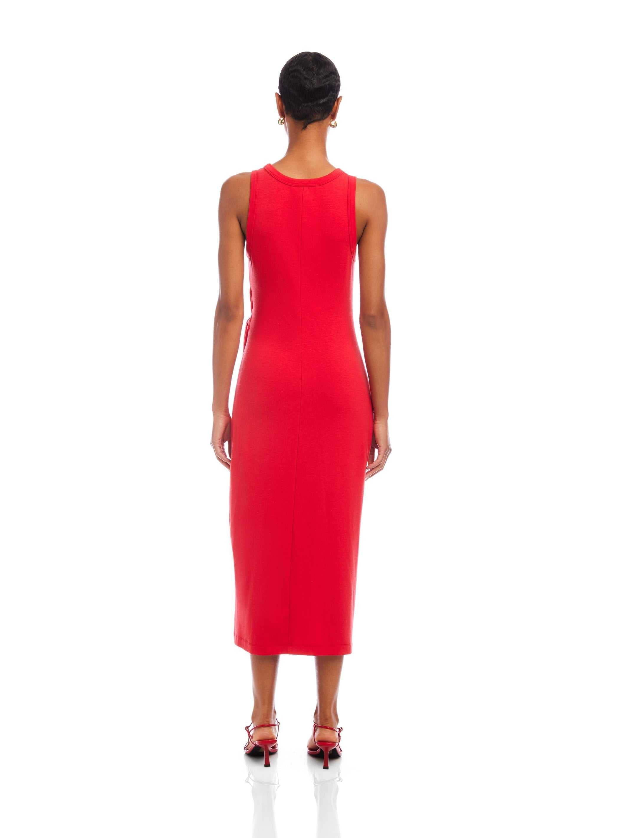 Back view of a woman wearing a red Maddie Side-Knot Midi Dress, sleeveless with a crew neck and fitted silhouette.