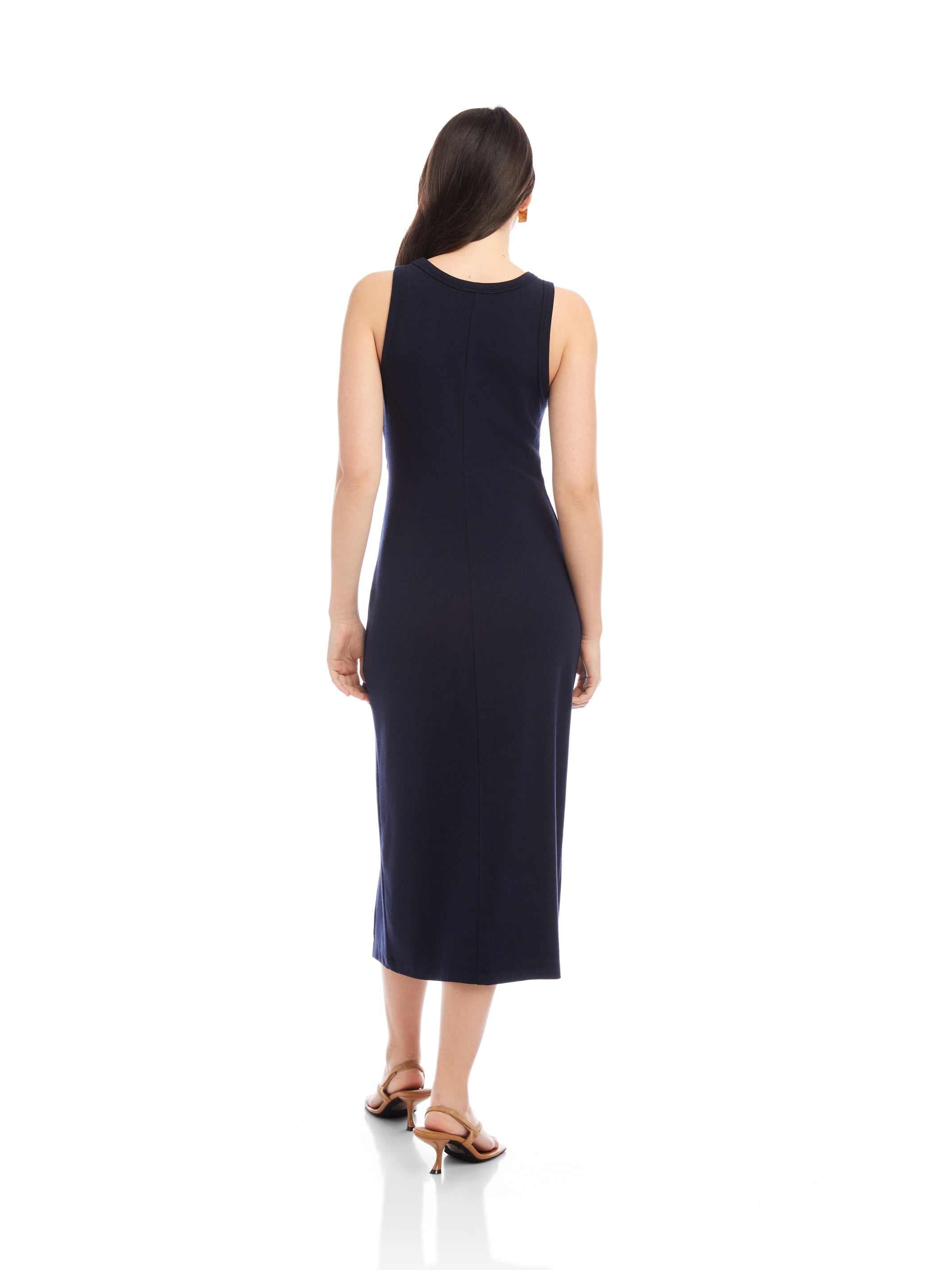 Woman wearing navy sleeveless Maddie Side-Knot Midi Dress with crew neck, back view