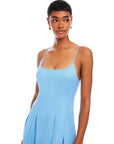 woman wearing sleeveless light blue Jessa Midi Dress with adjustable straps and scoop neck