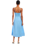 Back view of a woman wearing a blue Jessa Midi Dress with adjustable straps and a flowy midi-length hem.