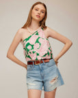 Woman wearing Vanita One-Shoulder Top with asymmetrical neckline and fitted silhouette