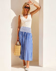 Rhea Stripe Skirt midi-length with smocked waistband and full silhouette in classic stripe shirting