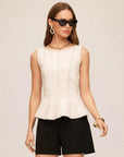 Zoyla Contrast Stitch Top sleeveless peplum twill blouse with vertical contrast stitching and scoop neck
