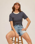 Women wearing Mandy Contrast Top with rib knit fabric and contrast crew neckline