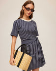 Woman wearing Darla Side-Knot Contrast Dress with side-knot detail and contrast neckline
