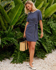 Woman wearing Darla Side-Knot Contrast Dress with fitted rib knit fabric and side-knot detail