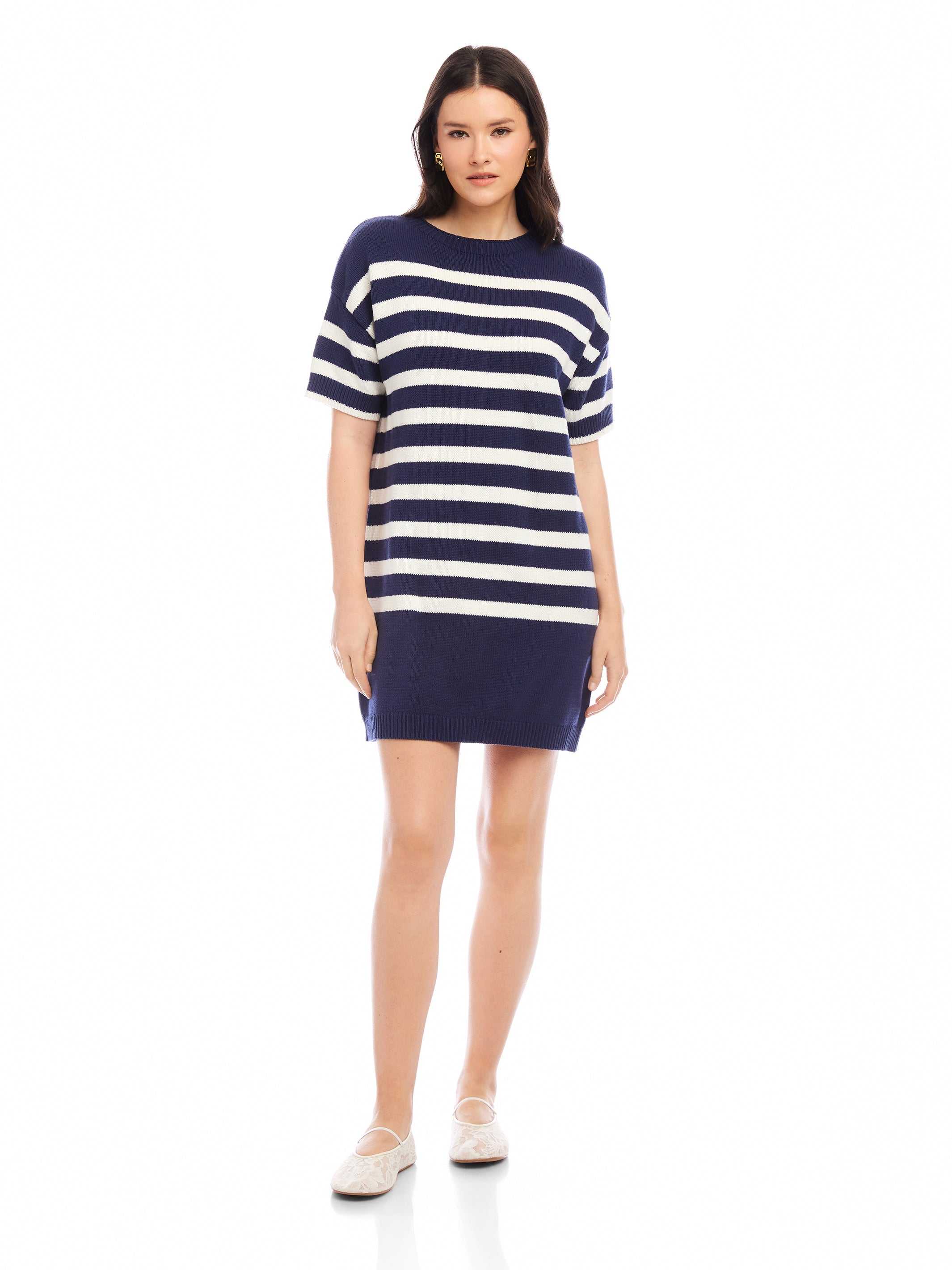 Woman wearing navy and white striped Georgette Sweater Dress with short sleeves and crew neck