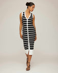 Woman wearing Jenna V-Neck Sweater Dress, cozy sleeveless knit with front buttons and V-neckline