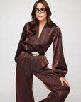 Skyler Jumpsuit shimmer fabric relaxed fit elastic waist V-neck long blouson sleeves side pockets