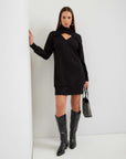 Claylee Crossover Turtleneck Dress in black knit, with long sleeves, a crossover neckline and cutout detail, and a mini-length straight silhouette.