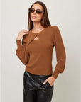 Amelia Bolero Shrug sweater with layered cropped overlay, ribbed trim, voluminous sleeves, and button front closure