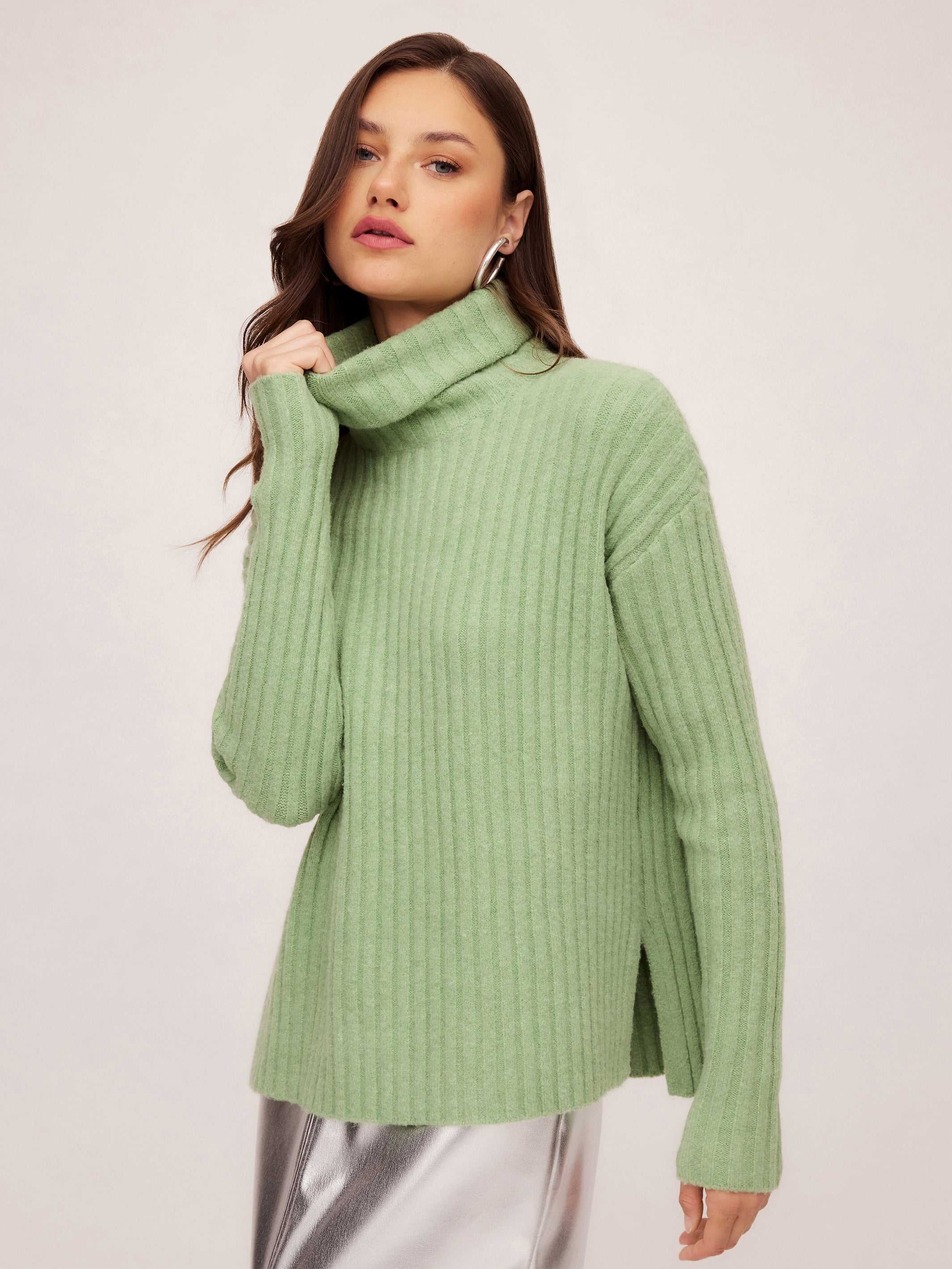 Sage Claudia Turtleneck Sweater with wide rib detail, side slits, and long sleeves for cozy, stylish cold weather wear