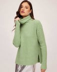 Sage Claudia Turtleneck Sweater with wide rib detail, side slits, and long sleeves for cozy, stylish cold weather wear