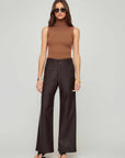 woman wearing Lara faux leather wide-leg pants with brown sleeveless top and sunglasses