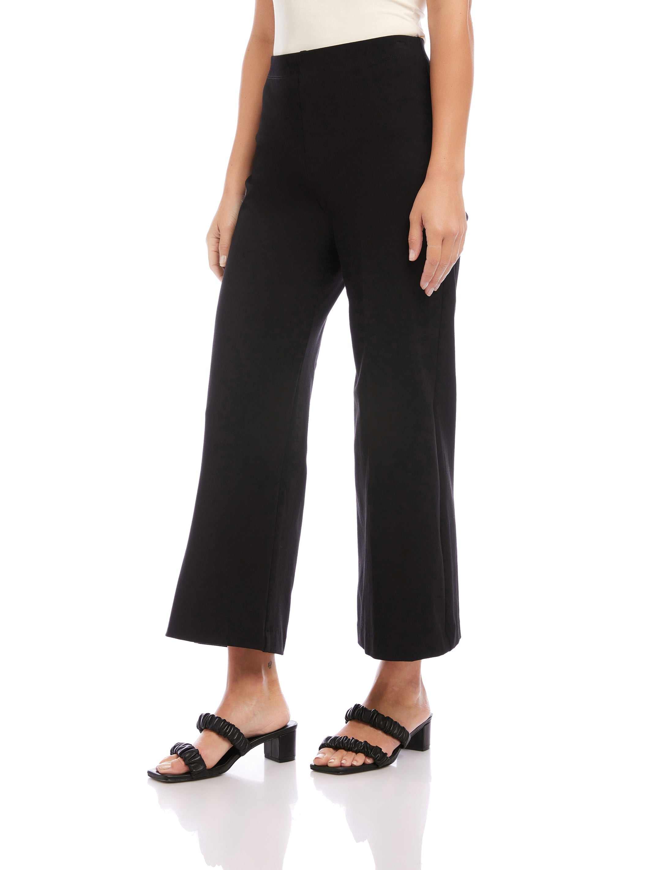 Black wide-leg cropped pants with elastic waistband and pull-on style on model