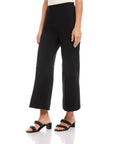Black wide-leg cropped pants with elastic waistband and pull-on style on model