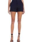 Navy modern shorts with double stretch twill fabric and zip fly closure on female model