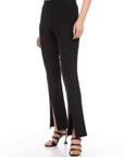 Harlow Bootcut Pants in black double face crepe with front slits and tailored minimalist silhouette.