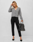 Close-up of Danae Ankle Slit Pants in faux suede knit with slim ankle-length fit and slit hem