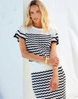 Uma Crochet Sweater Top with flutter sleeves and semi-sheer crochet knit design
