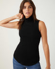 Woman wearing black sleeveless turtleneck slim-fit rib-knit top with shirttail hem