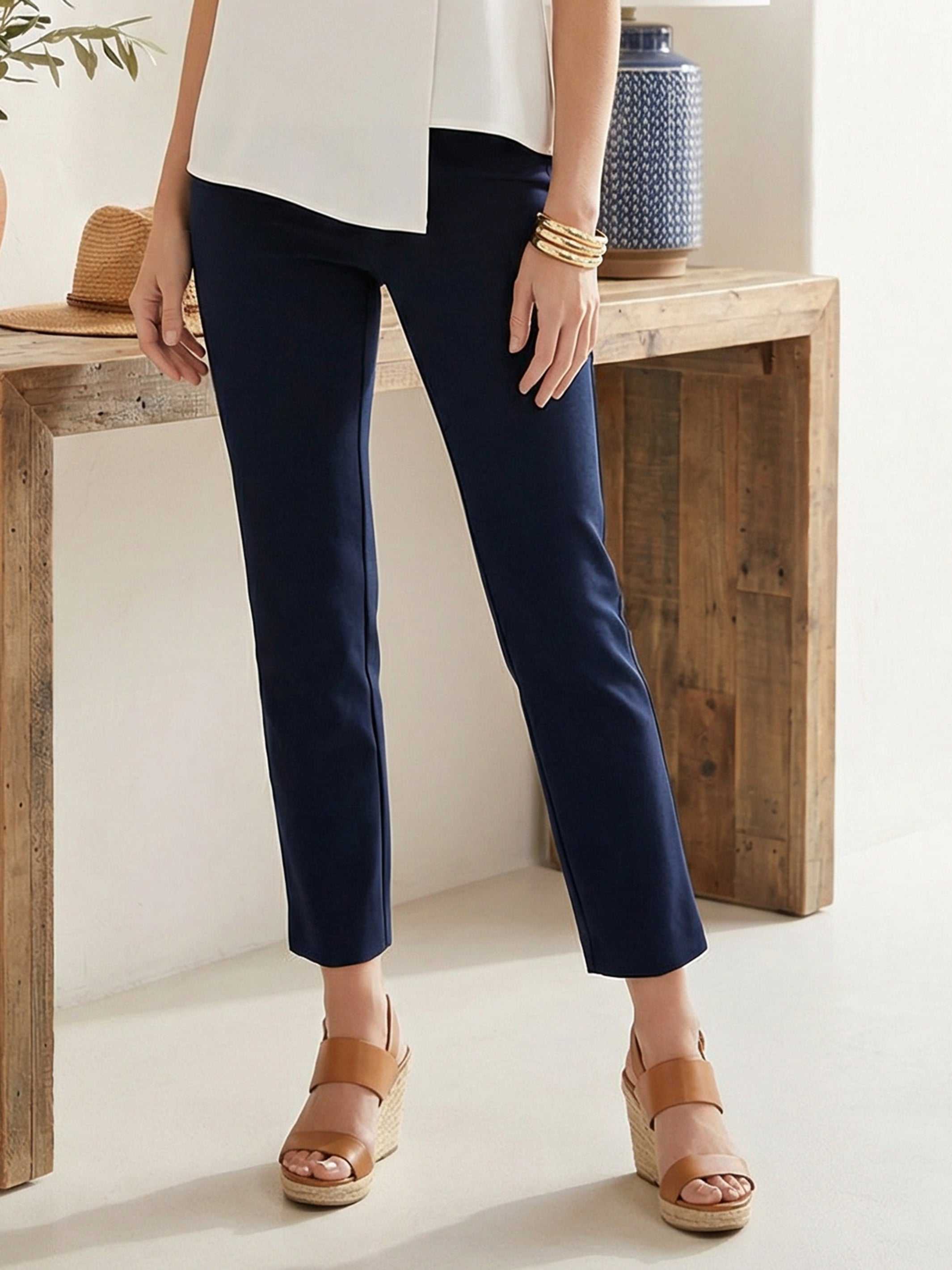 Woman wearing stylish ankle slit pant with elastic waistband in a casual setting