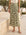 Green Eva Bias Ankle Skirt with elastic waist and floral satin print, midi length and flowy silhouette