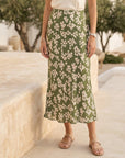 Green Eva Bias Ankle Skirt with elastic waist and floral satin print, midi length and flowy silhouette