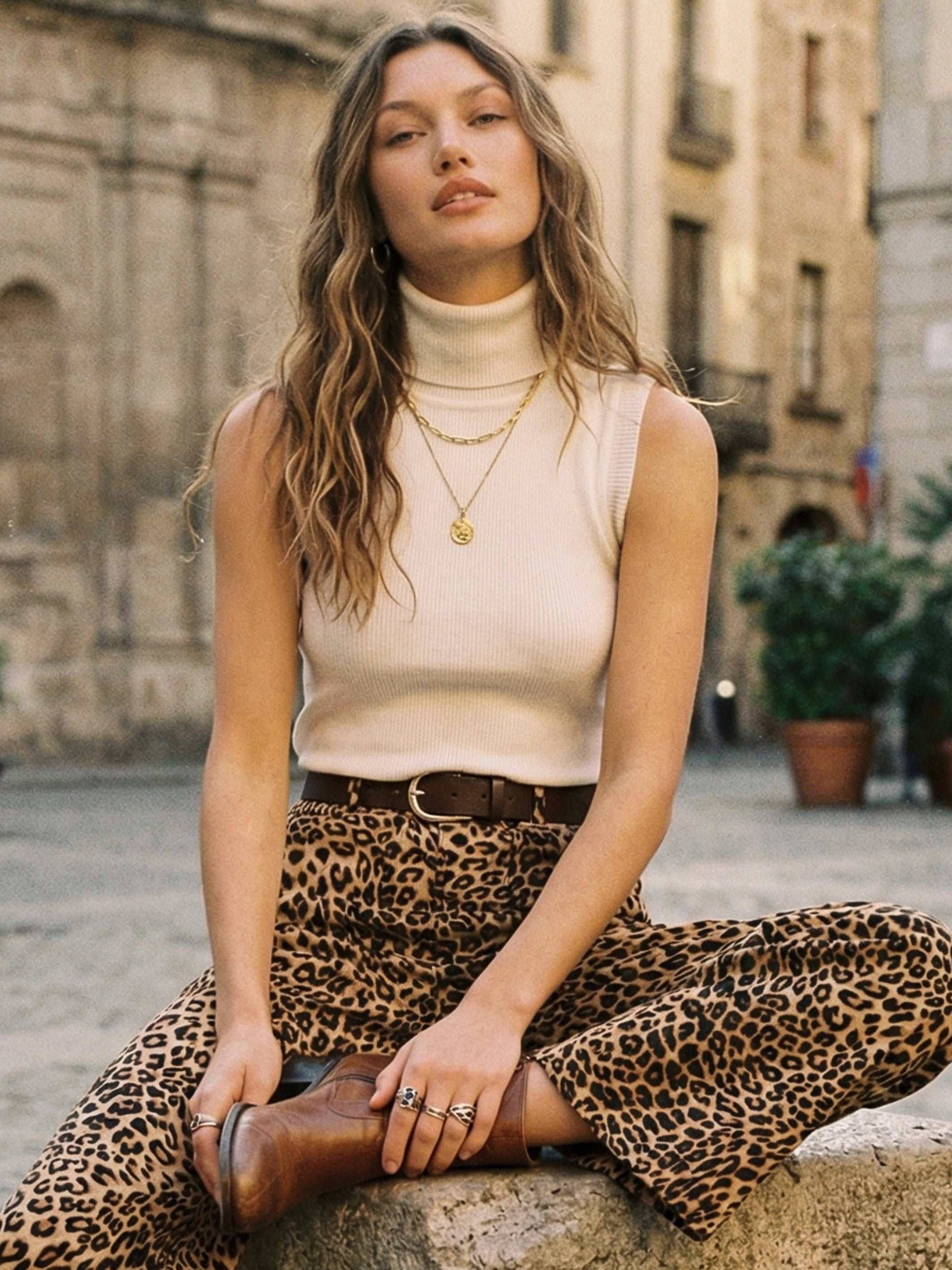 Kelli Turtleneck Sweater sleeveless ribbed knit sweater with fold-over turtleneck in black