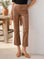 Brown latte Sigourney Pintuck Pants in faux leather with pintuck detailing and flared cropped legs